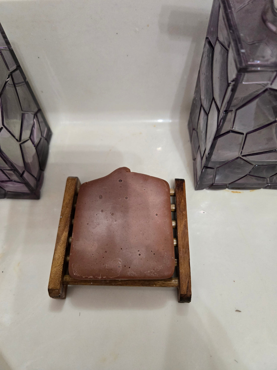 Big PaPaw’s Smoky Barn daily shower soap bar on a wooden draining dish after 43 days of use.